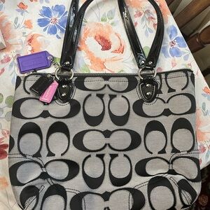 Like New Coach Black Signature Print Purple Interior Shoulder Bag